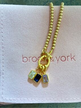 Brook & York Gold Plated Bracelet  with Blue and Pastel Gem Charms